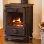 Cozy modern interior living room with wood burner